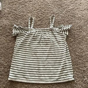 Green striped shirt.